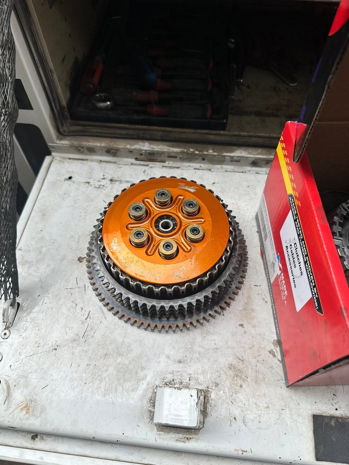 Clutch basket and plates laid out for inspection