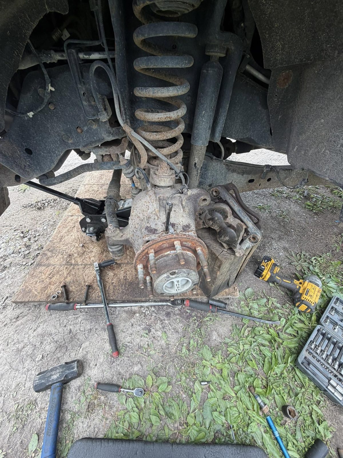 Coil spring and suspension components on a vehicle