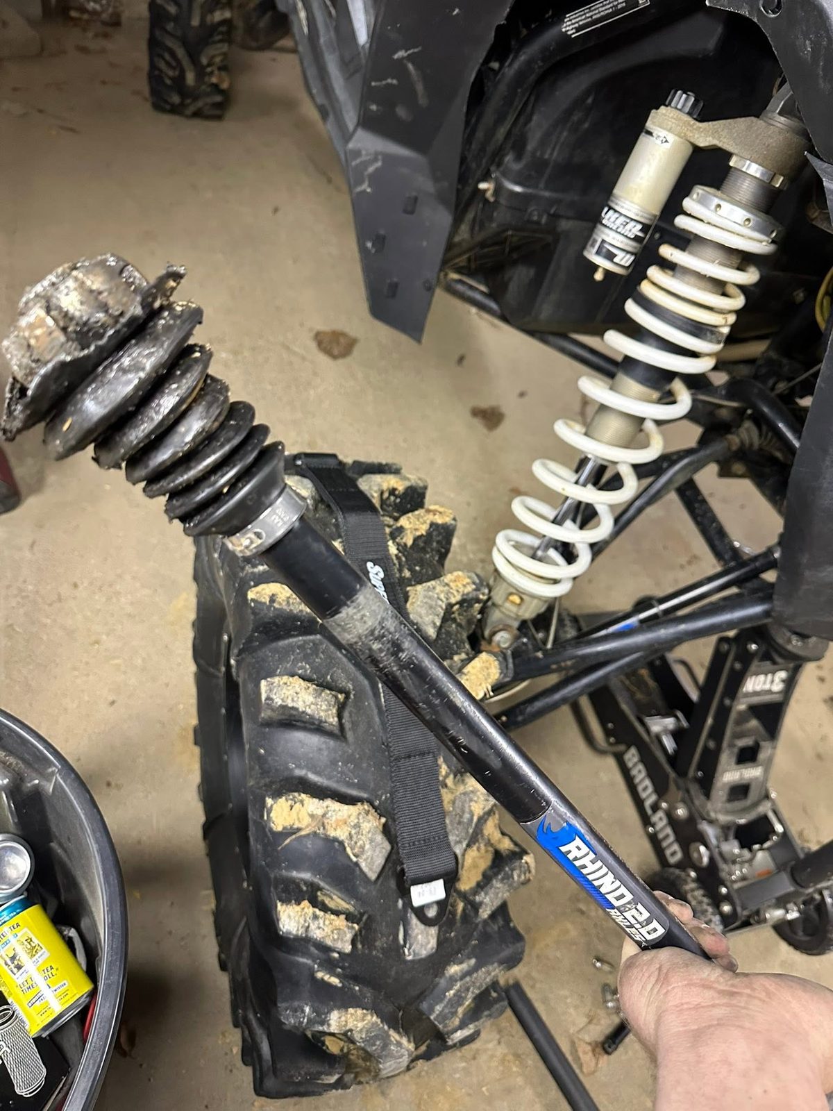 Side-by-side front suspension disassembled